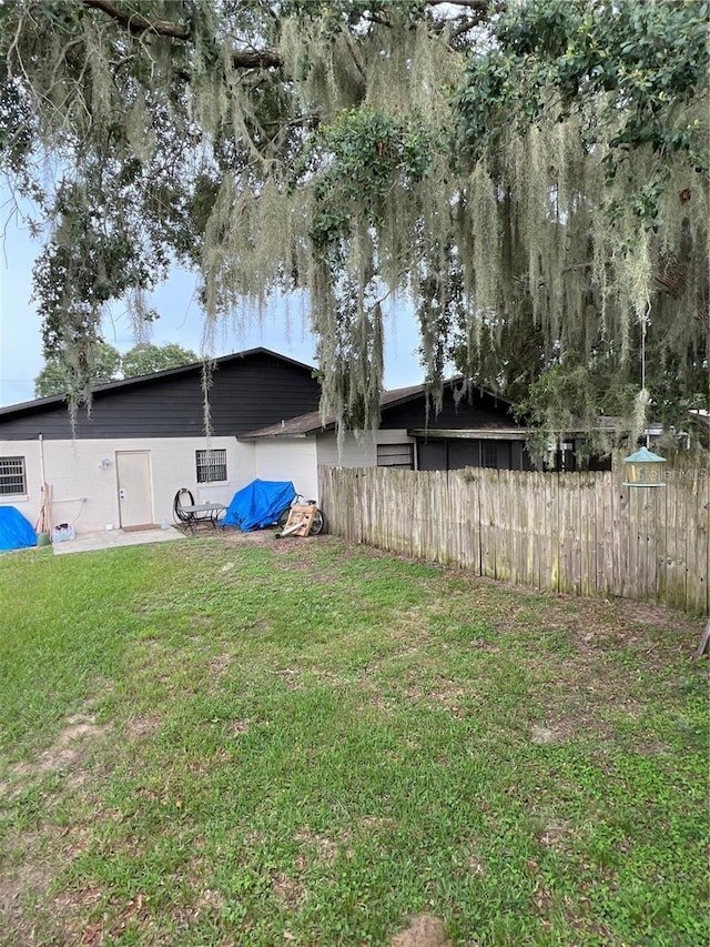 view of yard with fence