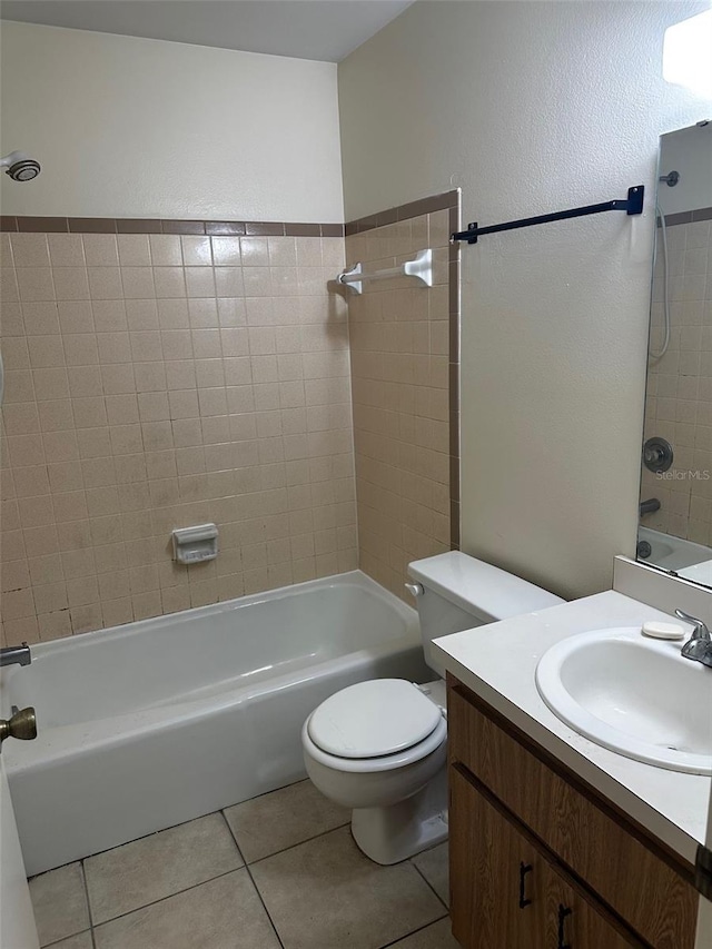 full bath with toilet, vanity, shower / bathtub combination, and tile patterned floors