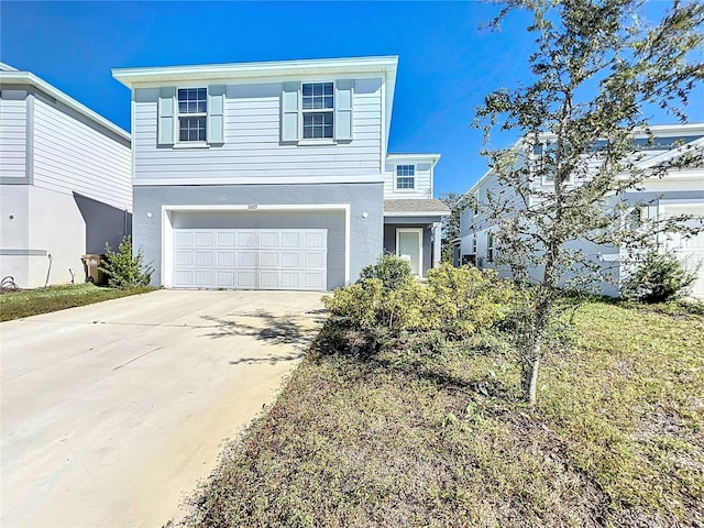 front of property featuring a garage