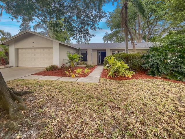 single story home with a garage