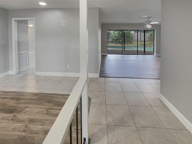 corridor featuring light hardwood / wood-style flooring