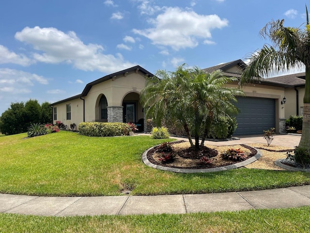 view of front of property featuring a garage and a front yard