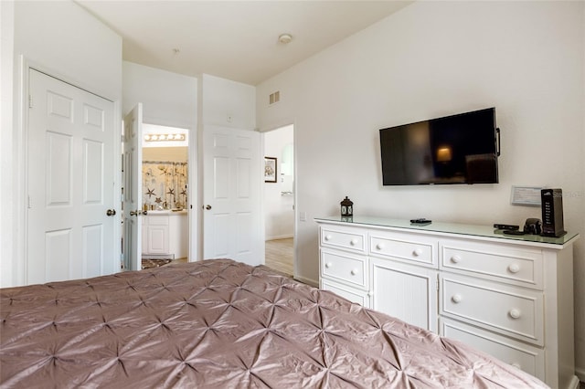 bedroom featuring hardwood / wood-style flooring