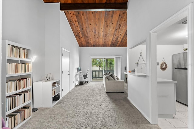 living room featuring beam ceiling, wooden ceiling, high vaulted ceiling, and light colored carpet