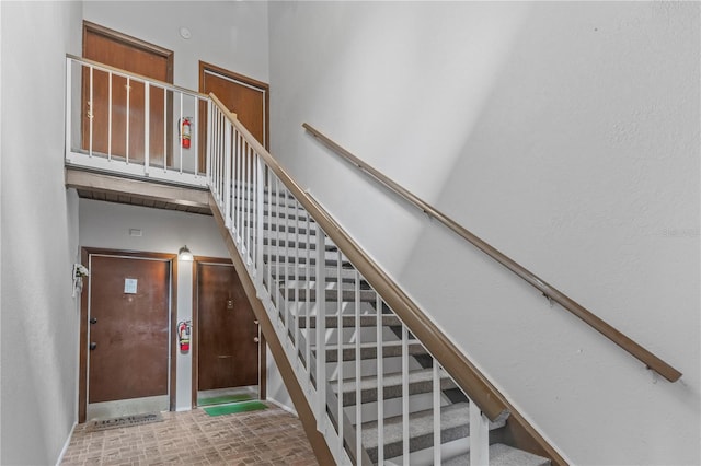 stairs featuring tile floors