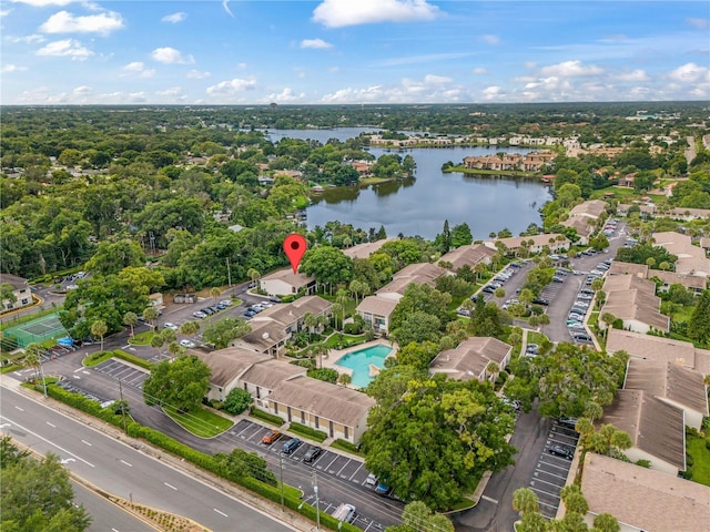 drone / aerial view with a water view