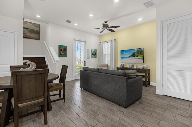 living room featuring ceiling fan