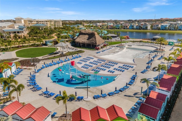 view of pool featuring a water view