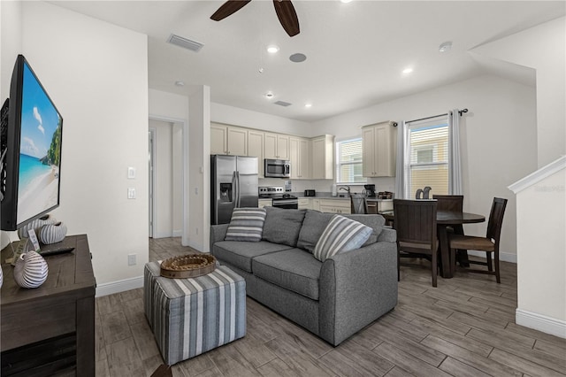 living room with ceiling fan