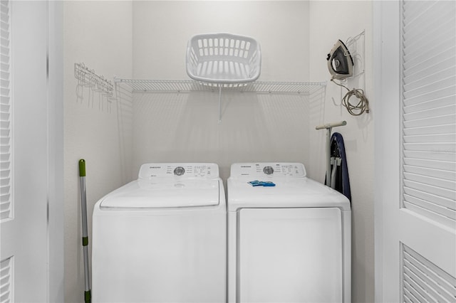 laundry area featuring separate washer and dryer