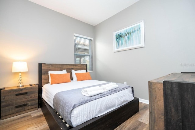 bedroom featuring light hardwood / wood-style floors