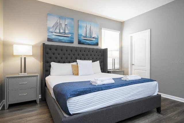 bedroom featuring dark hardwood / wood-style floors