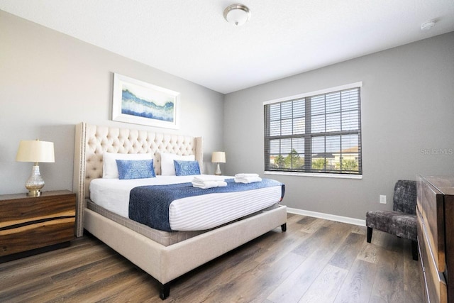 bedroom featuring hardwood / wood-style flooring