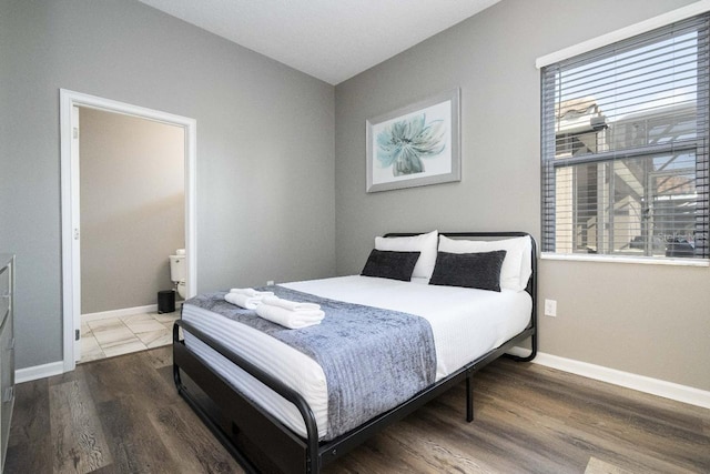 bedroom featuring wood-type flooring