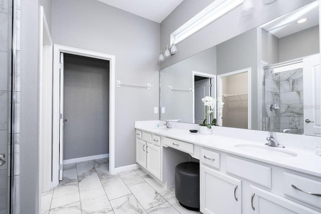 bathroom featuring tile flooring, vanity with extensive cabinet space, an enclosed shower, and double sink