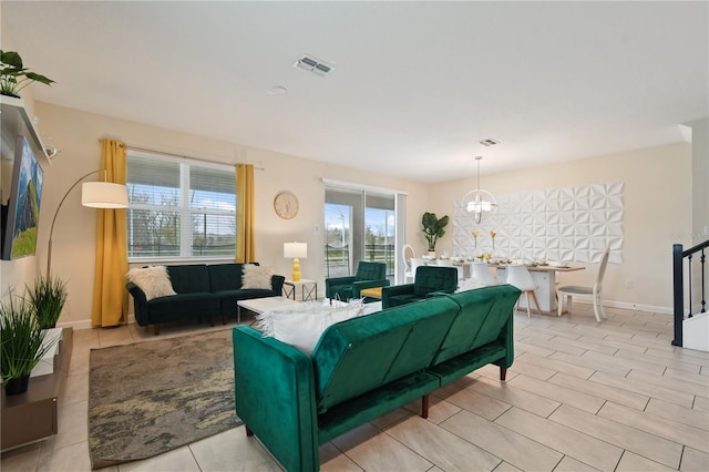 living room featuring an inviting chandelier