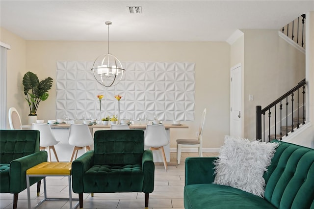 living room with a notable chandelier