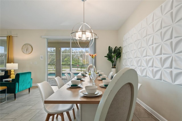 8834 Cabot Cliffs Dr, Davenport, FL 33896 - dining space with a chandelier and light tile patterned flooring