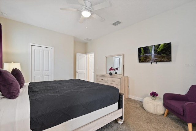 bedroom featuring carpet floors, a closet, and ceiling fan