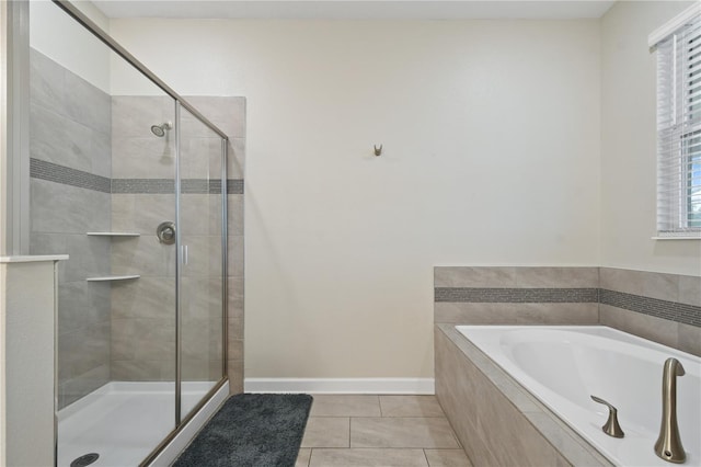 bathroom with tile patterned flooring and independent shower and bath