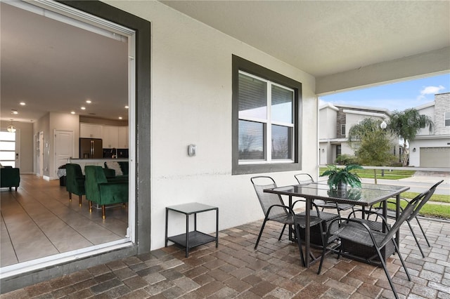 8834 Cabot Cliffs Dr, Davenport, FL 33896 - view of patio / terrace with outdoor dining area