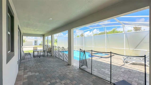 8834 Cabot Cliffs Dr, Davenport, FL 33896 - sunroom / solarium featuring a pool