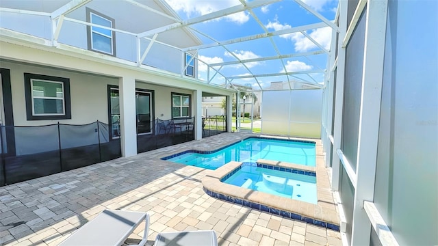 8834 Cabot Cliffs Dr, Davenport, FL 33896 - view of swimming pool with a patio area and a pool with connected hot tub