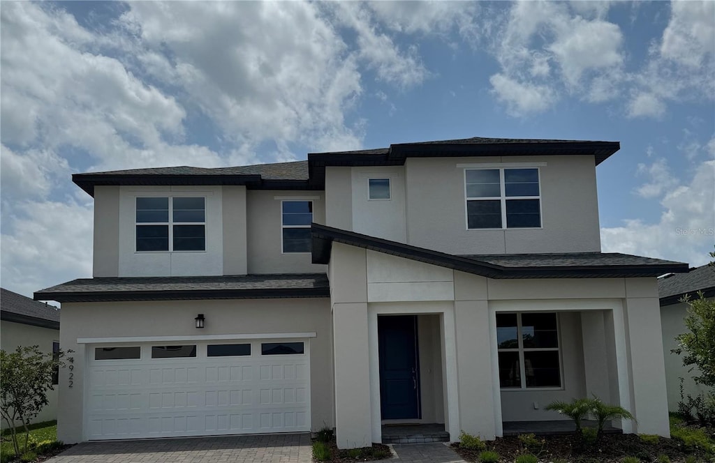 view of front of property featuring a garage