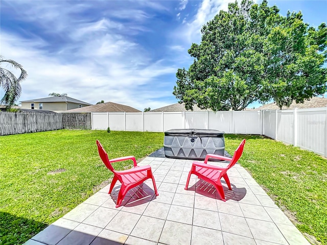 view of patio / terrace with a hot tub