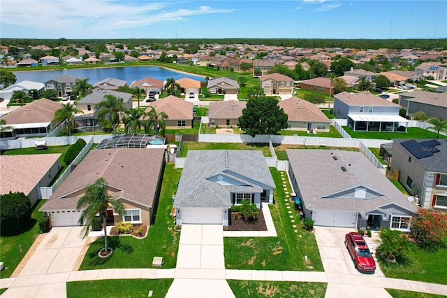 drone / aerial view with a water view