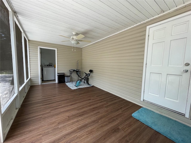 unfurnished sunroom with ceiling fan, washer / clothes dryer, and wooden ceiling