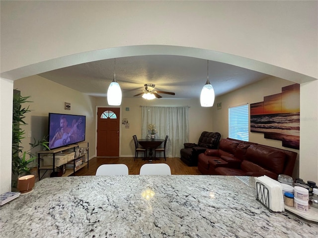 interior space featuring dark hardwood / wood-style floors and ceiling fan