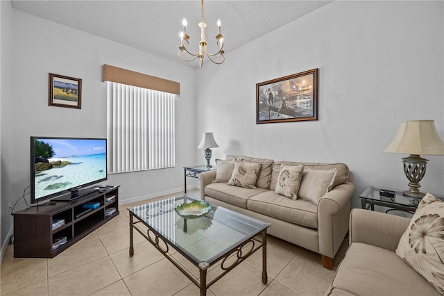 tiled living room featuring a notable chandelier