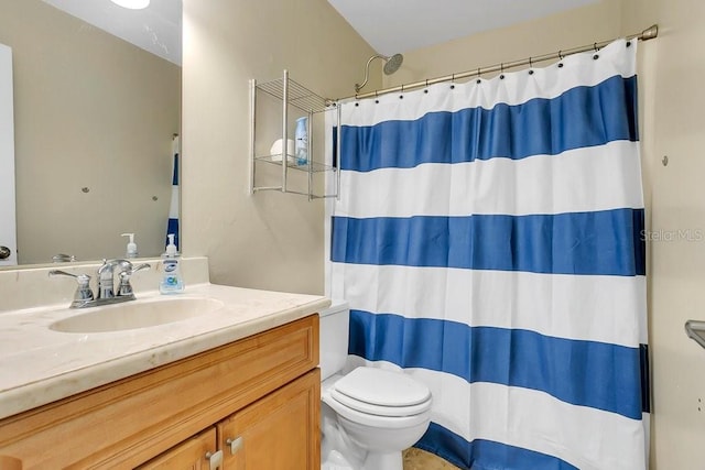 full bath featuring toilet, a shower with curtain, and vanity