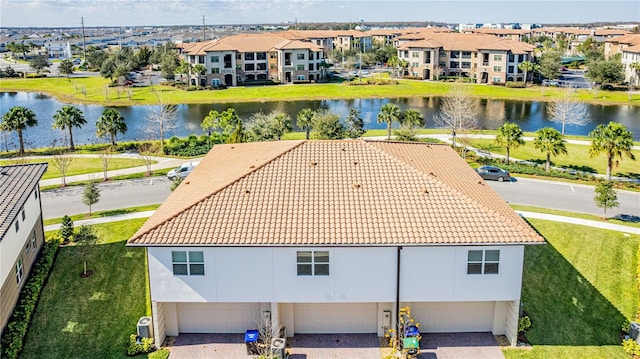 bird's eye view with a water view