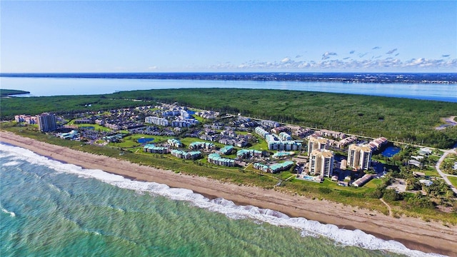 aerial view featuring a beach view and a water view