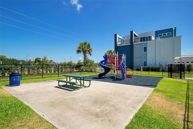 view of jungle gym with a lawn