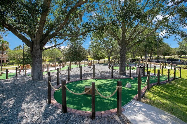 view of home's community featuring a lawn