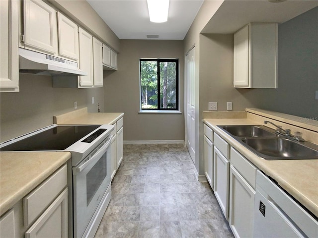 kitchen featuring white electric range, dishwasher, white cabinets, sink, and light tile floors