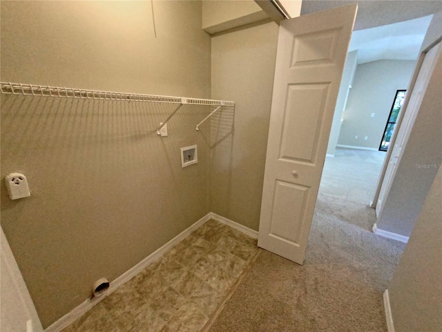 clothes washing area featuring tile floors and hookup for a washing machine