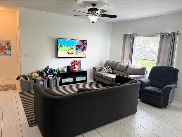 living room featuring ceiling fan