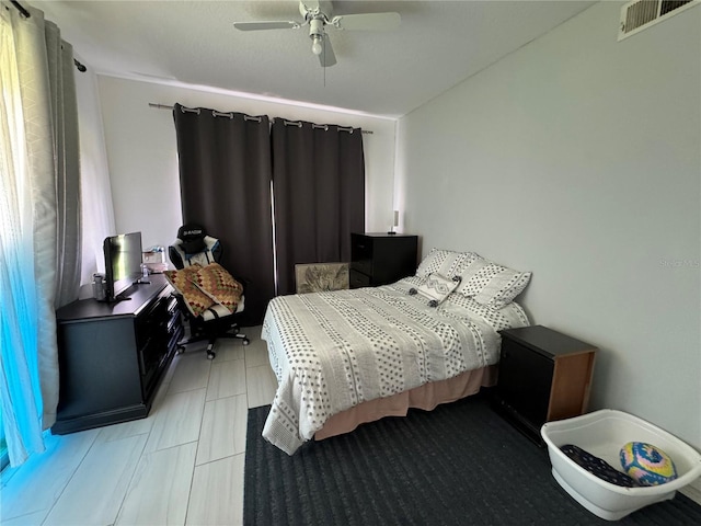 bedroom featuring ceiling fan