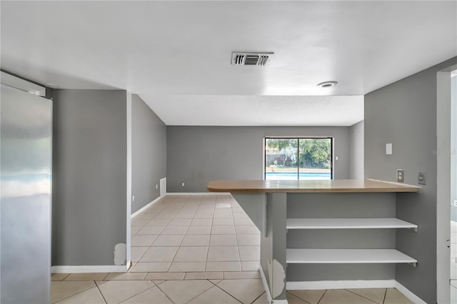 interior space with light tile floors