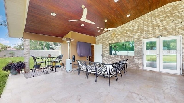 view of patio with ceiling fan and french doors