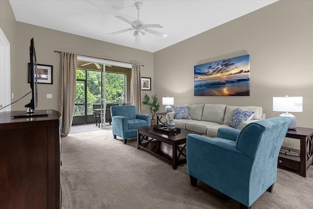 living room featuring light carpet and ceiling fan