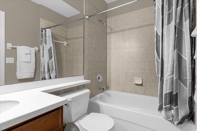 full bathroom with vanity, shower / bath combination with curtain, and toilet