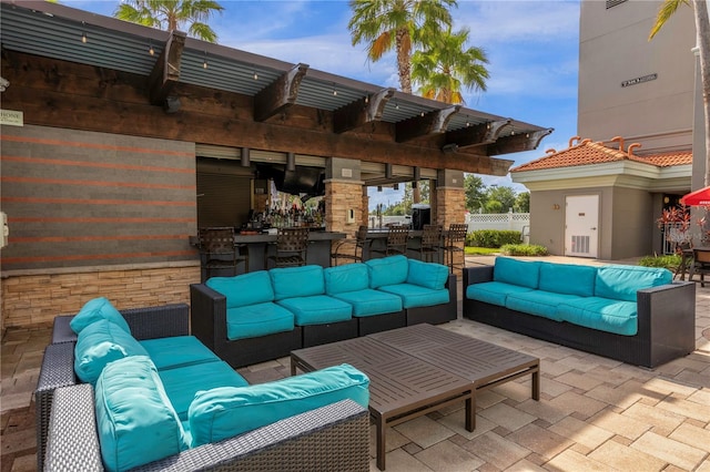 view of terrace with a pergola and an outdoor hangout area