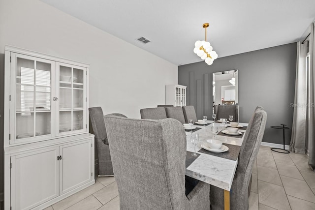 dining area with light tile floors