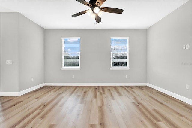 unfurnished room with ceiling fan and light hardwood / wood-style flooring