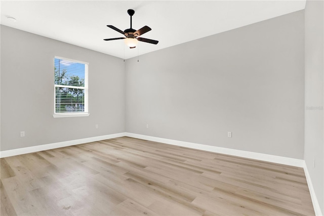 unfurnished room featuring ceiling fan and light hardwood / wood-style floors